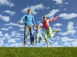 fly happy family on blue sky with clouds